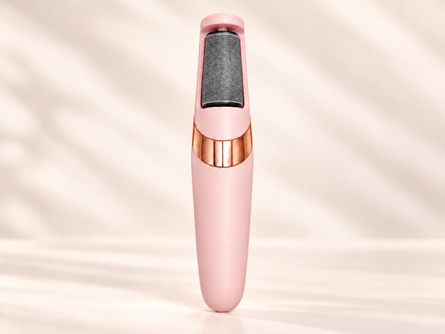 Uma lixa elétrica PéLisse rosé