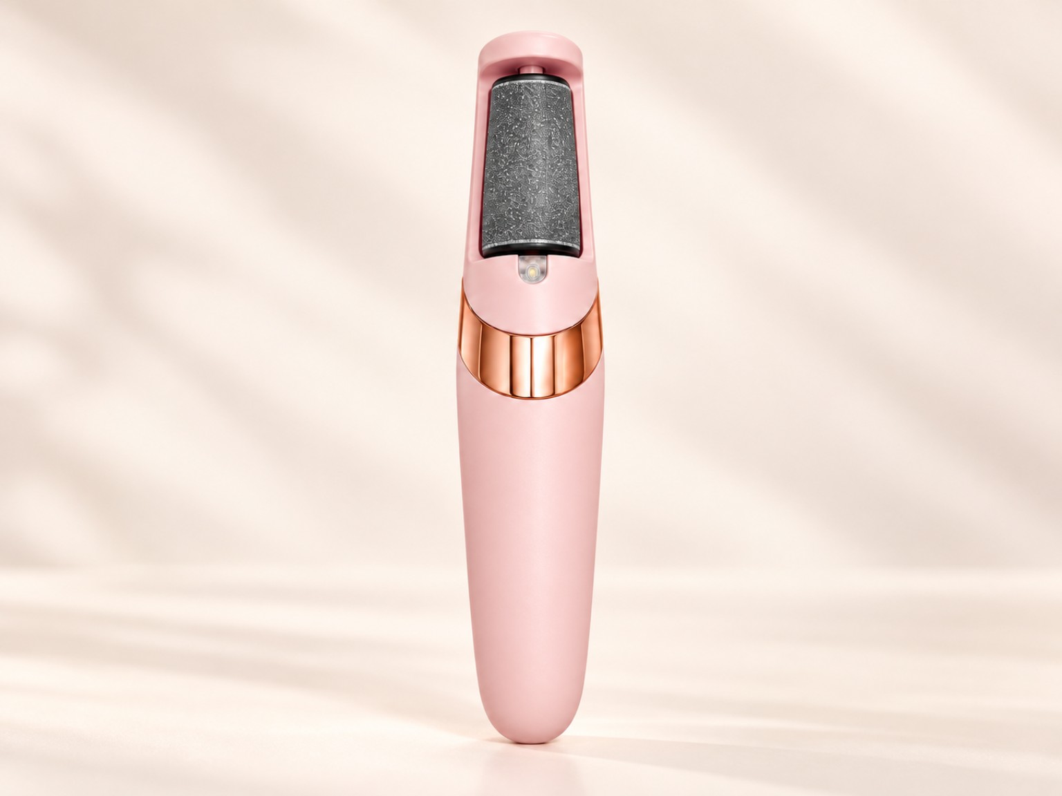 Uma lixa elétrica PéLisse rosé
